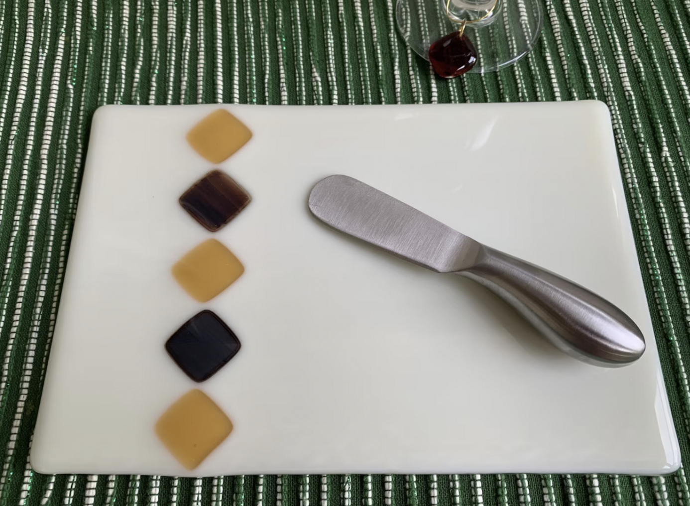 fused glass cheeseboard with cheese spreader