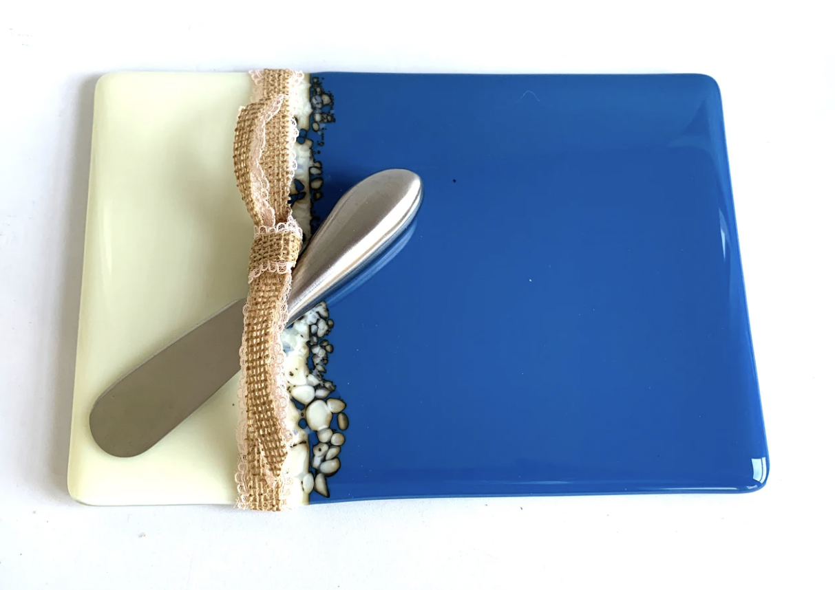 blue white glass cheeseboard with spreader